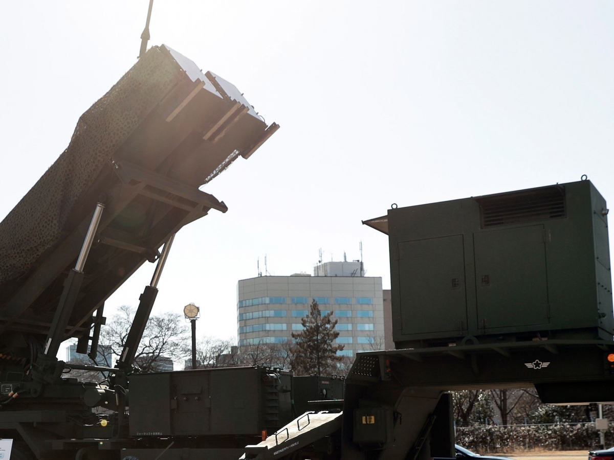 U.S. and Japanese officials, including U.S. Vice President Mike Pence and Japanese Defense Minister Itsunori Onodera, inspect a Japan self-defense force Patriot Advanced Capability-3 (PAC-3) missile interceptor, manufactured by Lockheed Martin Corp., at the Ministry of Defense in Tokyo on Feb. 7, 2018. MUST CREDIT: Bloomberg