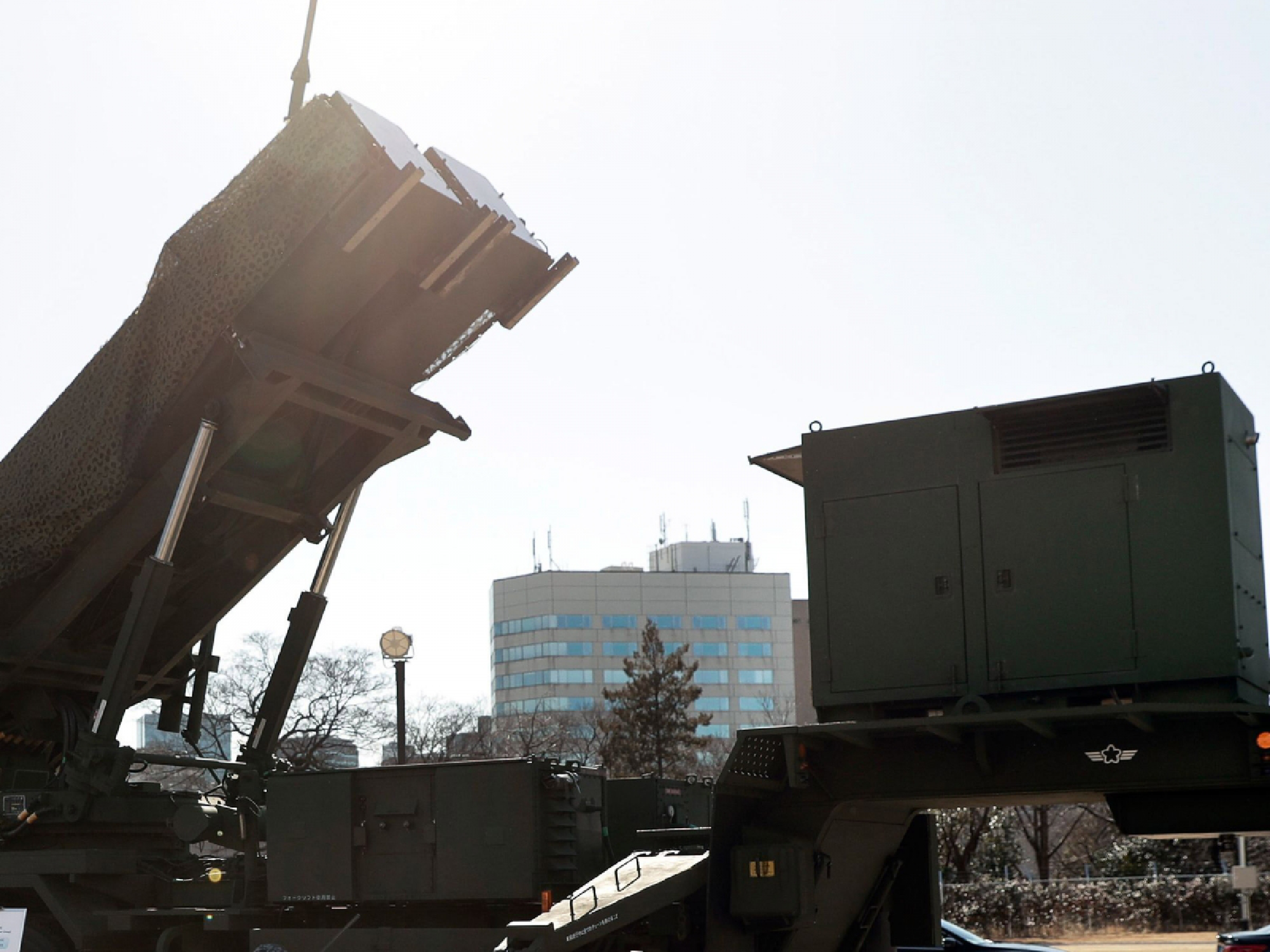 U.S. and Japanese officials, including U.S. Vice President Mike Pence and Japanese Defense Minister Itsunori Onodera, inspect a Japan self-defense force Patriot Advanced Capability-3 (PAC-3) missile interceptor, manufactured by Lockheed Martin Corp., at the Ministry of Defense in Tokyo on Feb. 7, 2018. MUST CREDIT: Bloomberg
