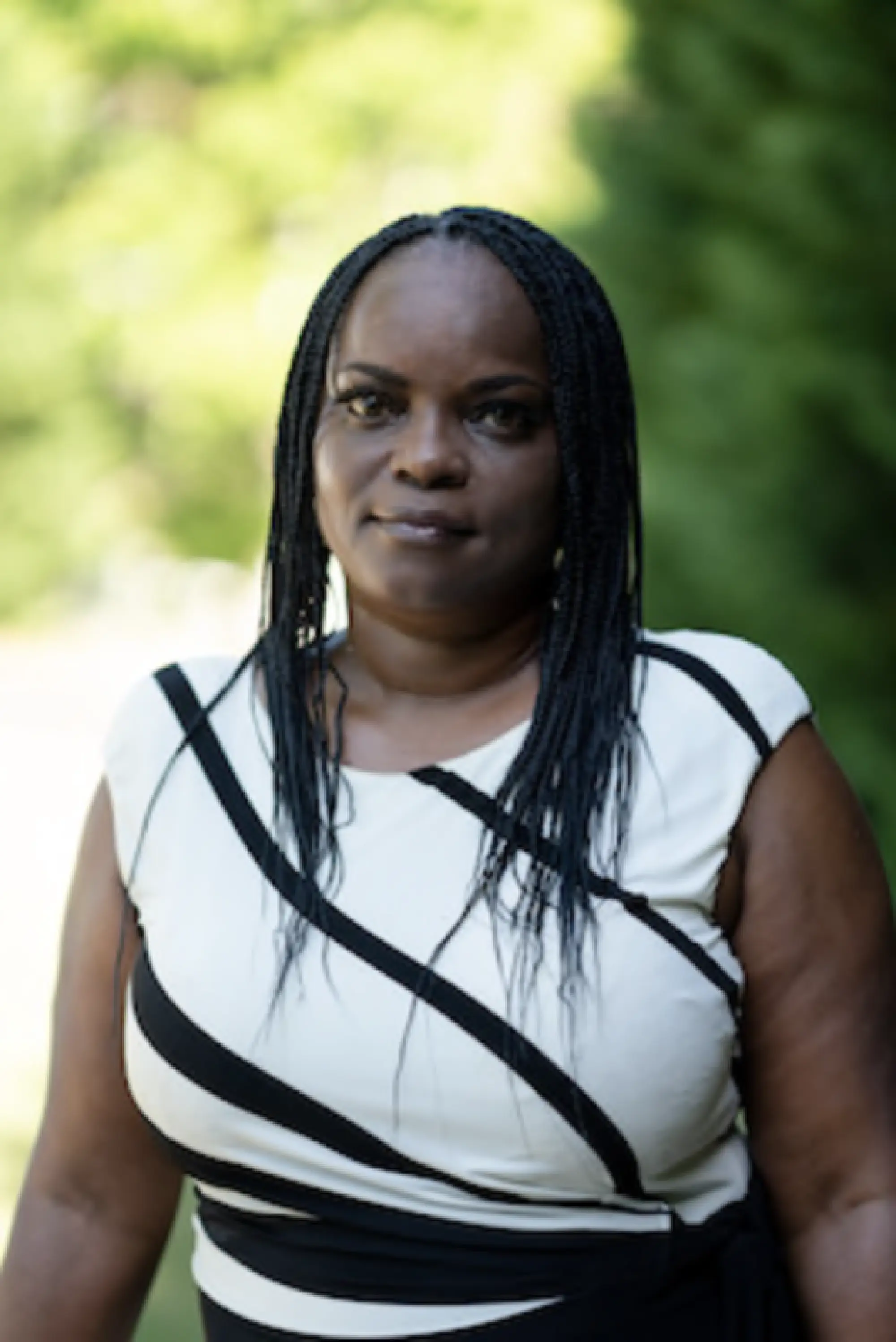 Roshon Green poses for a portrait outside her home in Lawrenceville, Ga., on Thursday, July 23, 2020. MUST CREDIT: Photo for The Washington Post by Kevin D. Liles Photo by: Kevin D. Liles — For the Washington Post