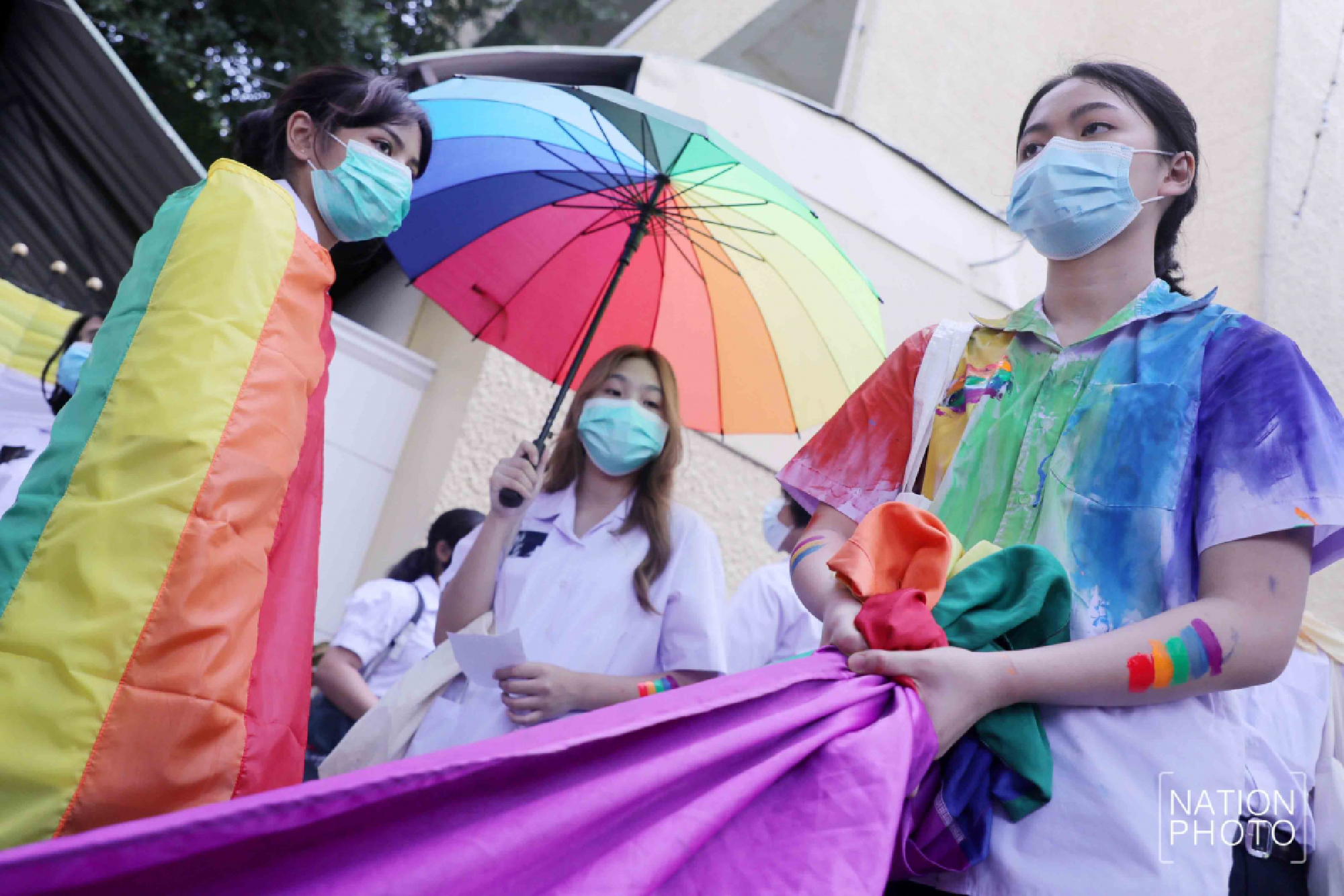 Flashes of rainbow colours as students call for equality