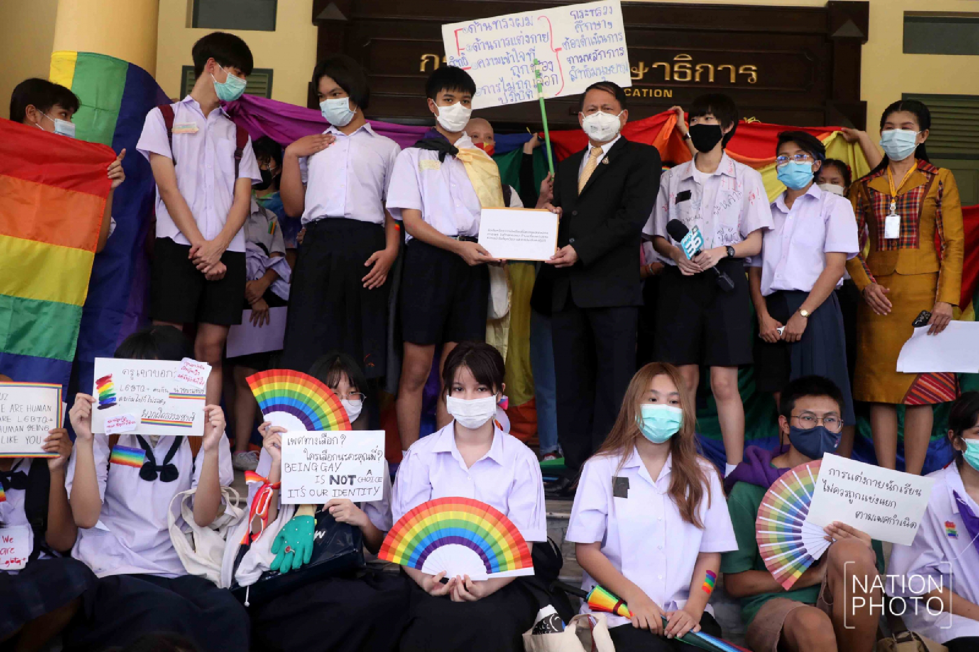 Flashes of rainbow colours as students call for equality