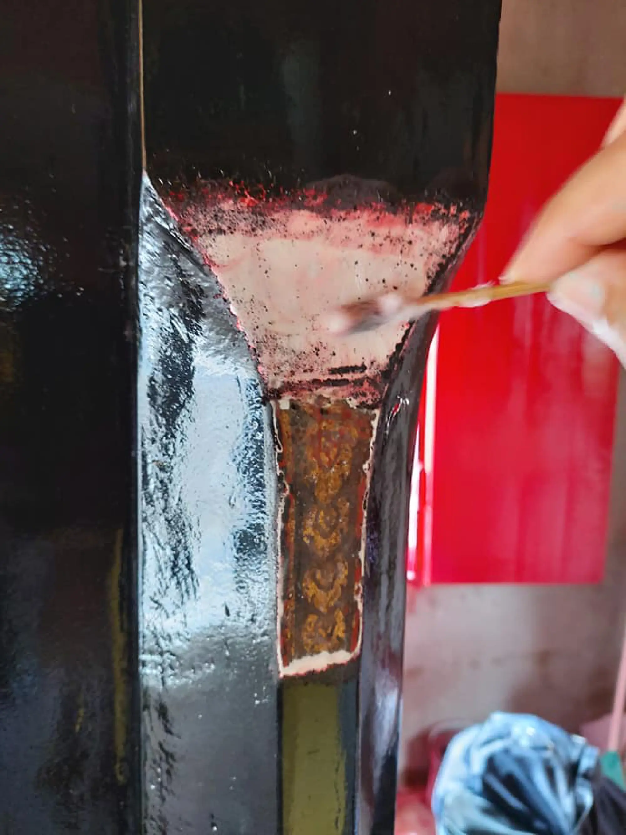Stripping ancient temple doors of resin, paint ‘will not be easy’