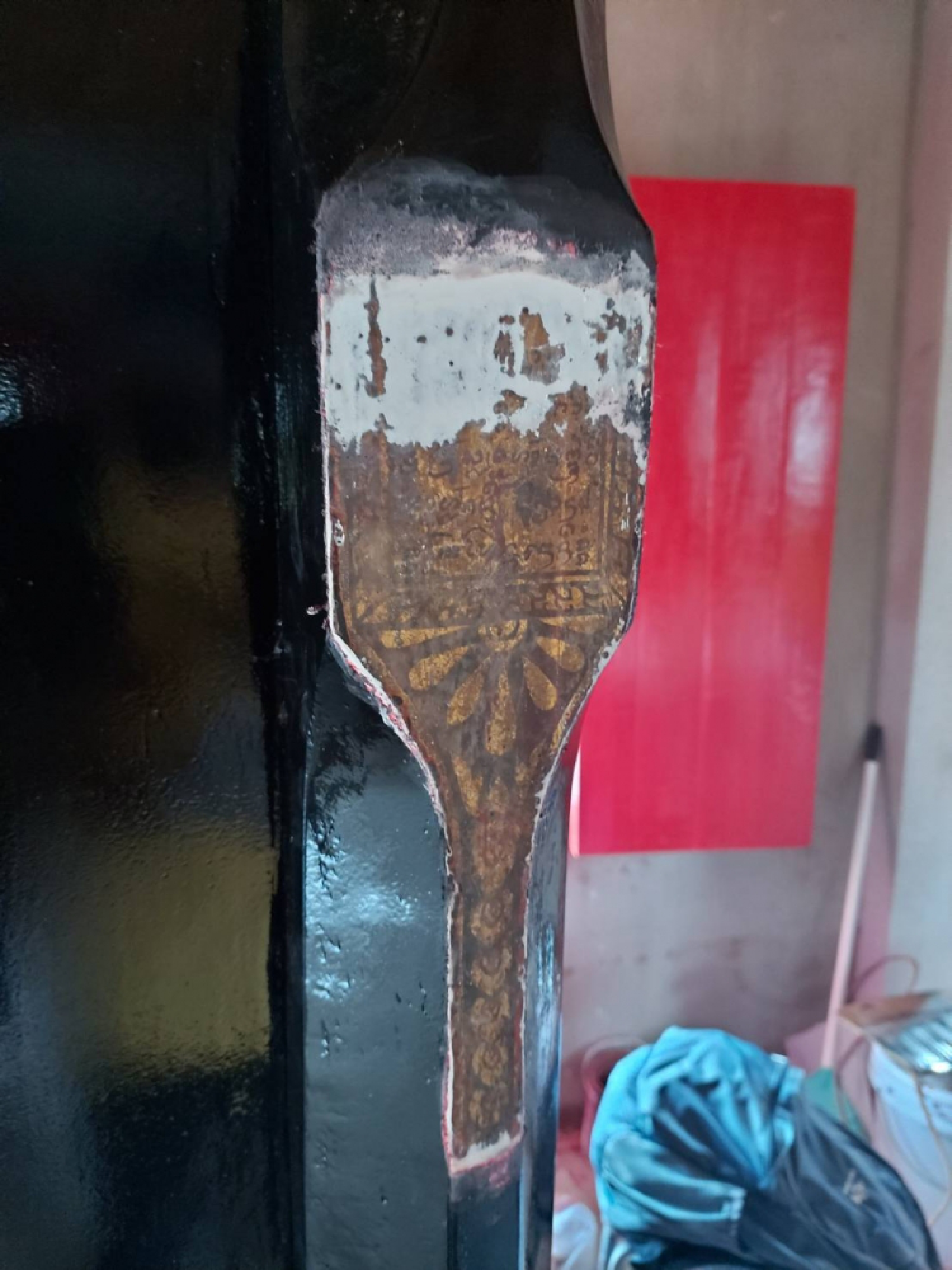 Stripping ancient temple doors of resin, paint ‘will not be easy’