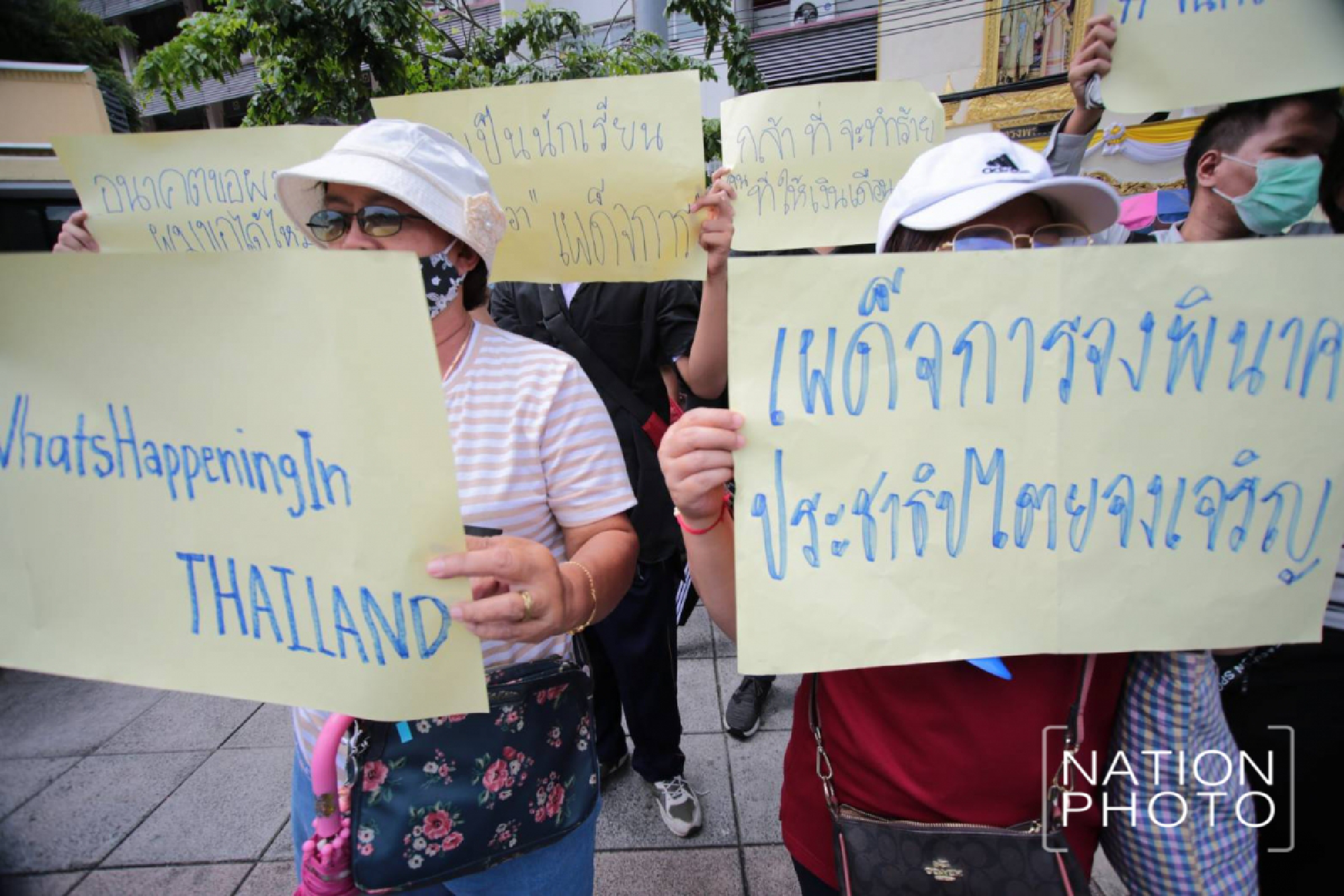 A huge crowd of student-led protesters are closing the roads around Democracy Monument in Bangkok