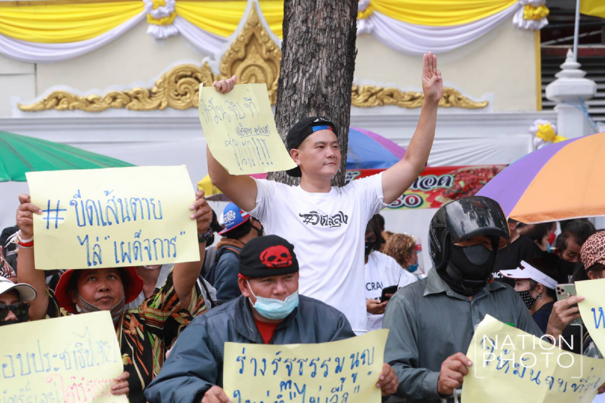 A huge crowd of student-led protesters are closing the roads around Democracy Monument in Bangkok