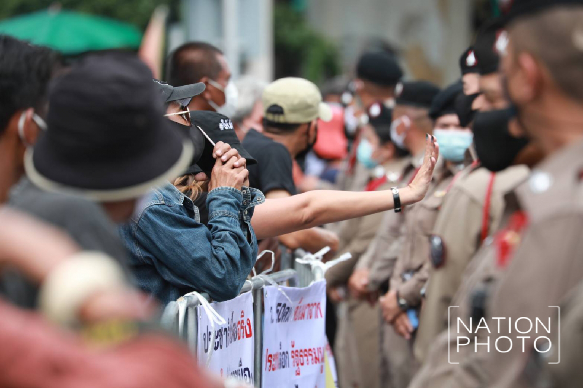 A huge crowd of student-led protesters are closing the roads around Democracy Monument in Bangkok
