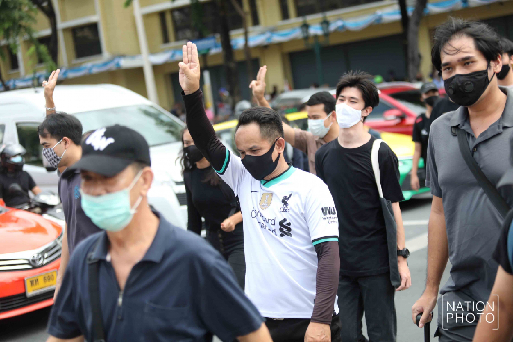 A huge crowd of student-led protesters are closing the roads around Democracy Monument in Bangkok
