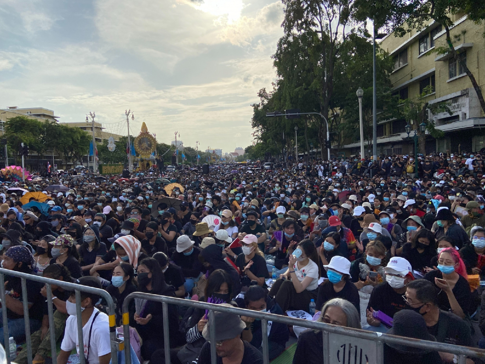 A huge crowd of student-led protesters are closing the roads around Democracy Monument in Bangkok