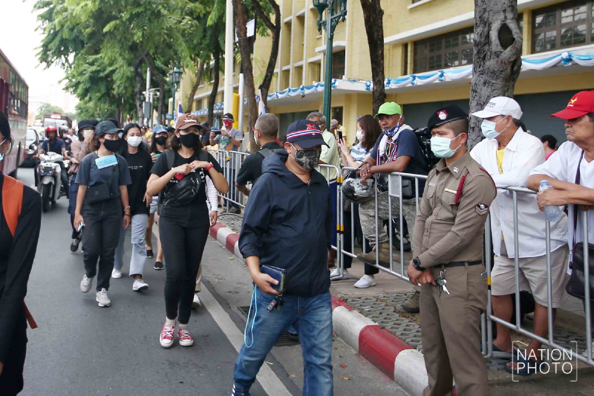 A huge crowd of student-led protesters are closing the roads around Democracy Monument in Bangkok