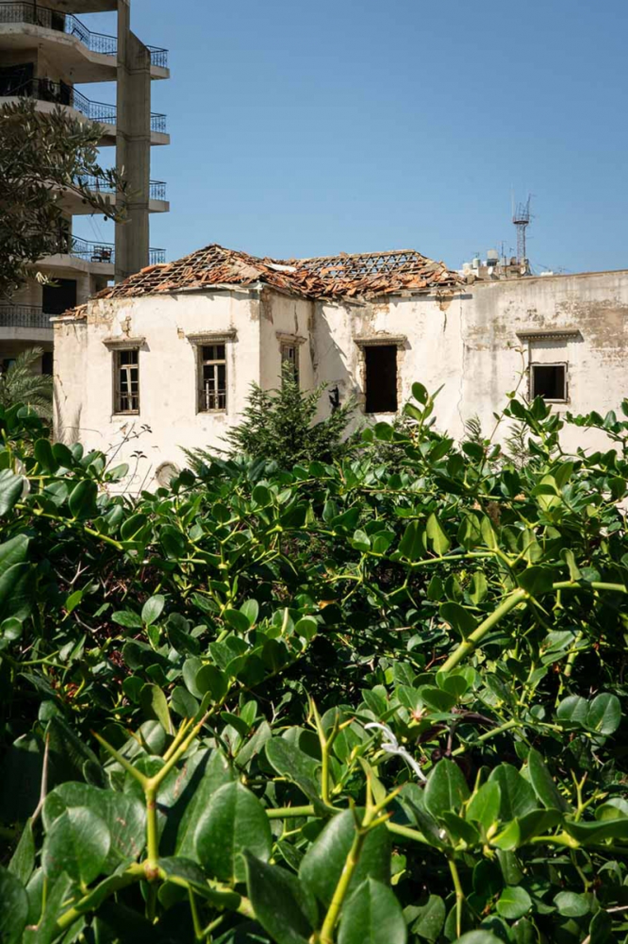The traditional red tile roof of an old house in the Hikme neighborhood of Beirut iwas destroyed. MUST CREDIT: For The Washington Post by Manu Ferneini