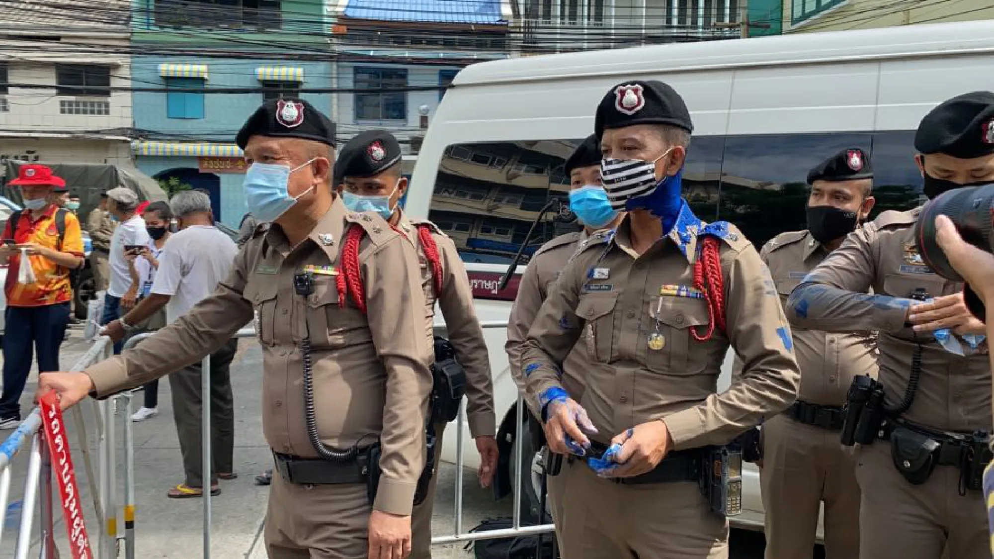 Tension boils over as protest leaders report to police