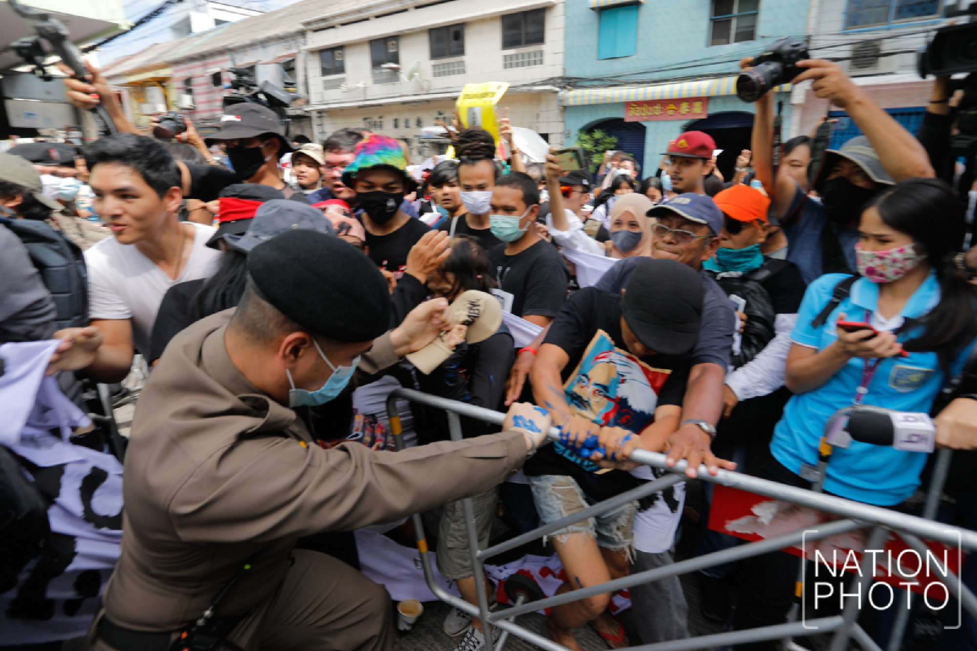 Tension boils over as protest leaders report to police