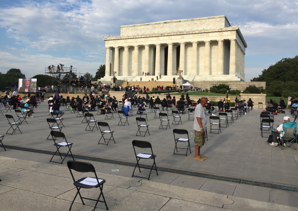 Social distancing in the seating arrangement at Friday's "Get Your Knee Off Our Necks" March on Washington. MUST CREDIT: Photo for The Washington Post by Astrid Riecken