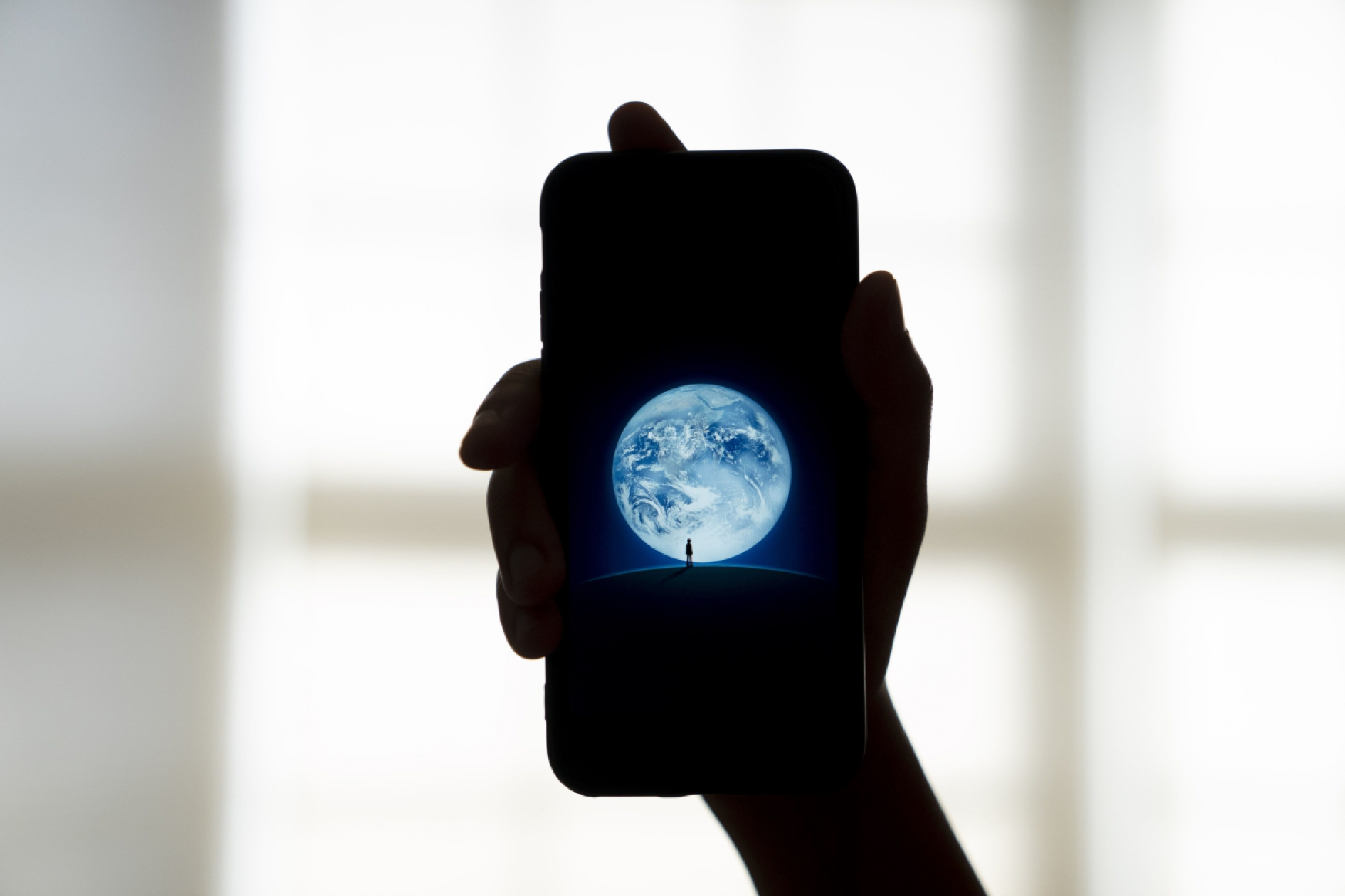 Tencent's WeChat app is displayed on a smartphone in an arranged photograph taken in Arlington, Va., on Aug. 7, 2020. MUST CREDIT: Bloomberg photo by Andrew Harrer