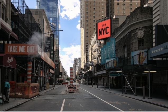 A scene from a deserted Broadway theater district, where venues have been shuttered since March. CREDIT: Photo for The Washington Post by Jeenah Moon