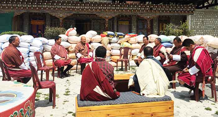 Gups of Paro handover the goods and money contributed by villagers to an official from the Gyalpoi Zimpon’s Office in the presence of Paro Dzongdag. Photo Credit: Kuensel