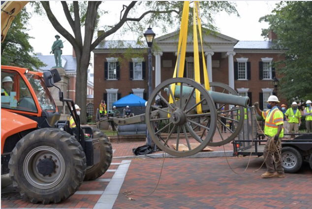 A cannon was hoisted by a forklift and removed from the side of the Confederate statue in front of the Albemarle County courthouse in Charlottesville, Va., on Sept. 12, 2020. CREDIT: Washington Post photo by John McDonnell.