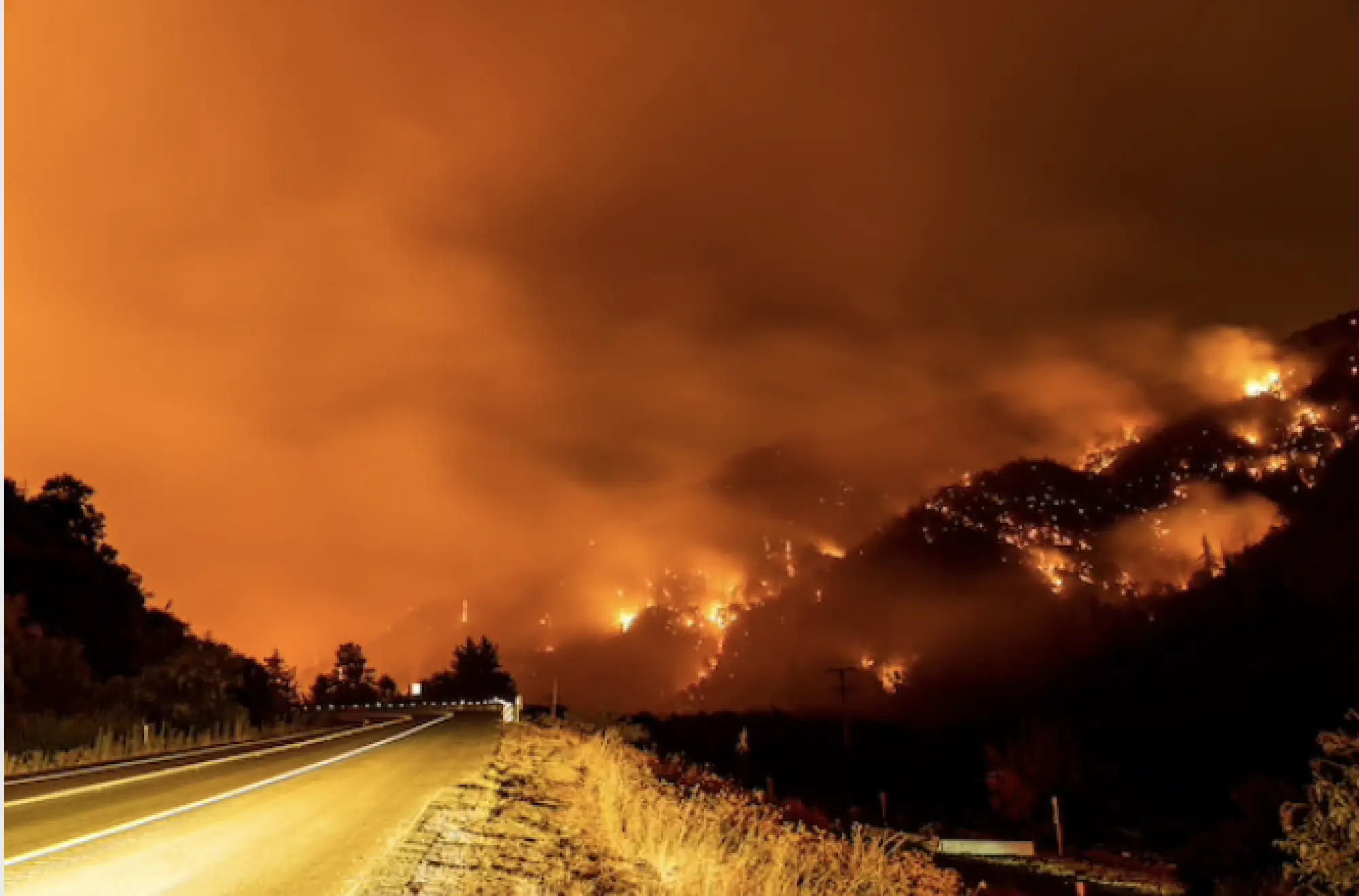 The El Dorado Fire burns a hillside in the San Bernardino National Forest near Yucaipa, Calif., on Wednesday. CREDIT: Photo by Kyle Grillot for The Washington Post