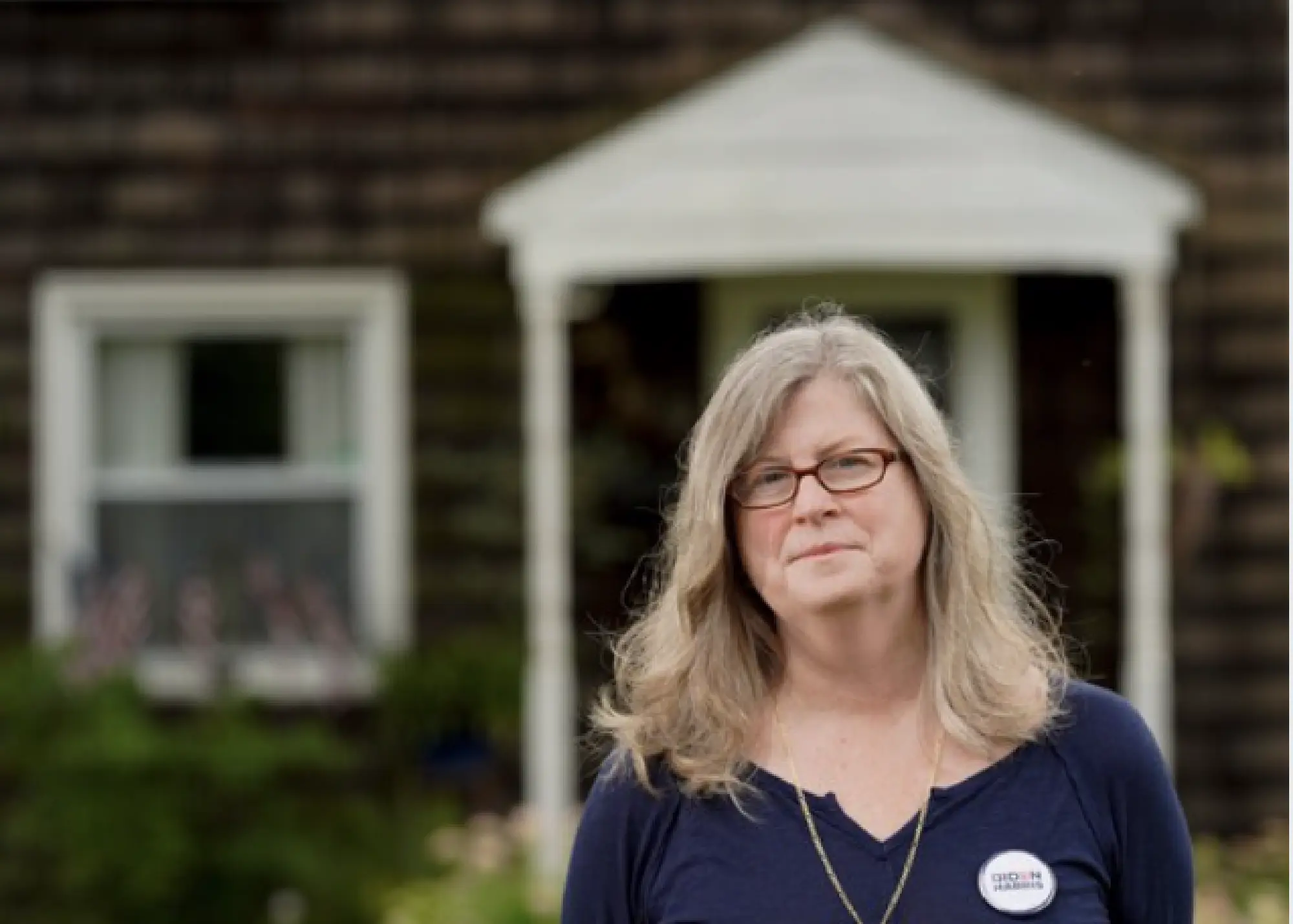 Nora Schreiber McDonough, outside her home in Trevose, Pa., where her family has lived for generations, said she has been at odds with her siblings over politics. She plans to vote for Joe Biden. CREDIT: Washington Post photo by Bonnie Jo Mount