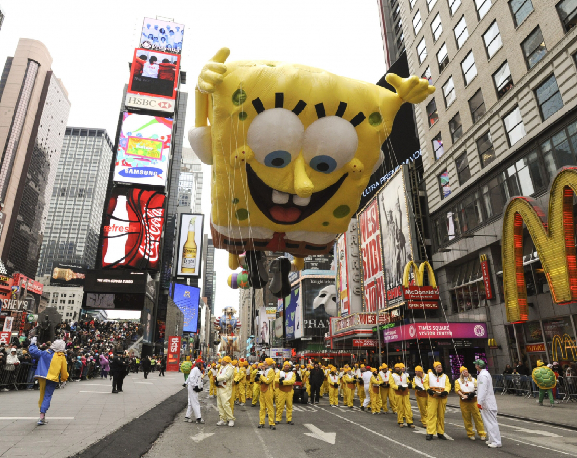 A SpongeBob SquarePants balloon floats through Times Square during the Macy's Thanksgiving Day Parade in New York on Nov. 25, 2010. MUST CREDIT: Bloomberg photo by Paul Goguen