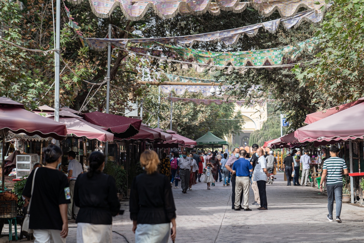 A visitor to Kashgar's Old City might think life looks relatively normal. But a close observer will notice that none of the men in this Muslim center have beards and none of the women wear hijab. Photo for The Washington Post by . Lorenz Huber