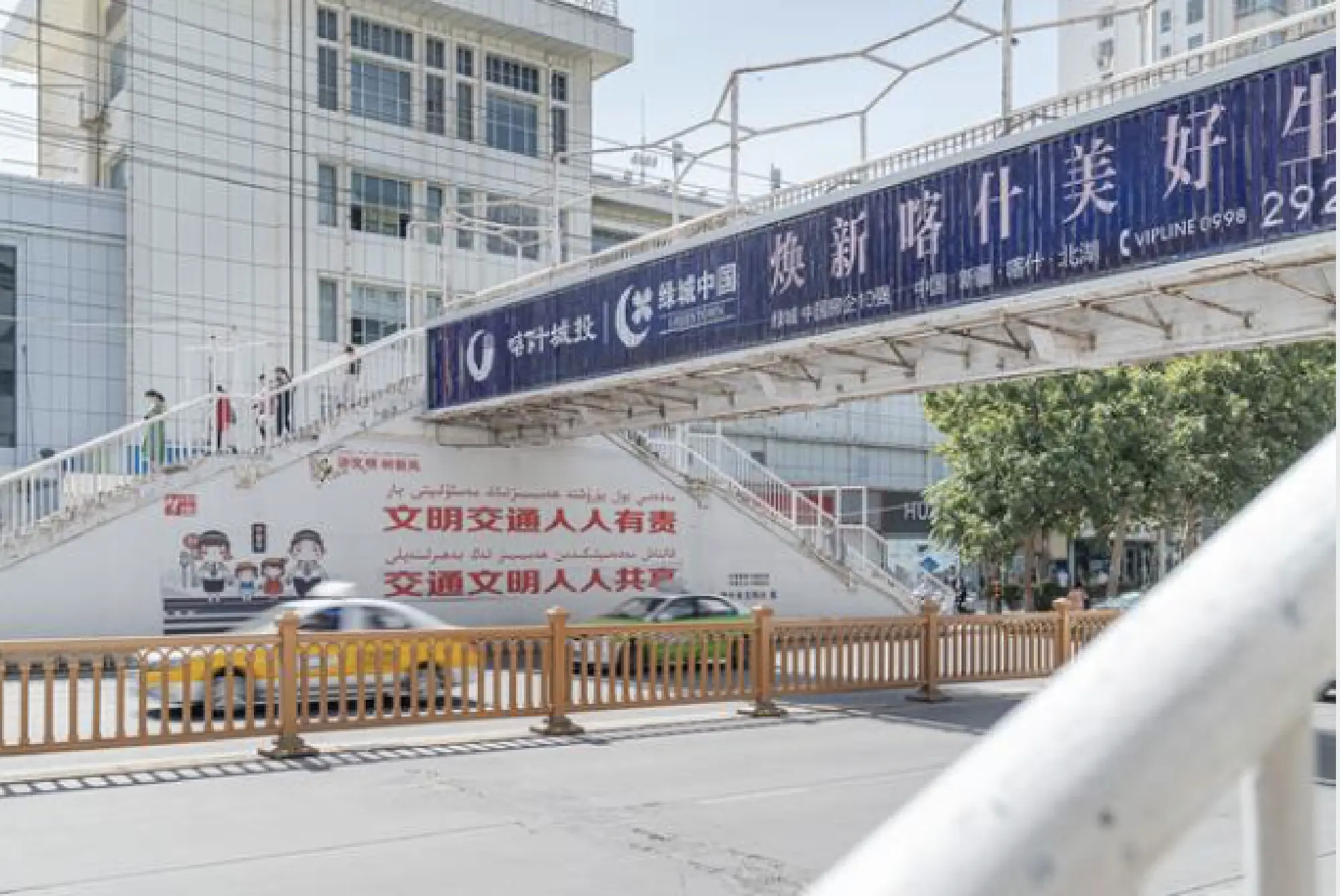 Almost all signs in Kashgar, the traditional capital of Uighur culture, are now written in Mandarin Chinese characters first, with the Uighur language relegated to second place. CREDIT: Photo for The Washington Post by Lorenz Huber