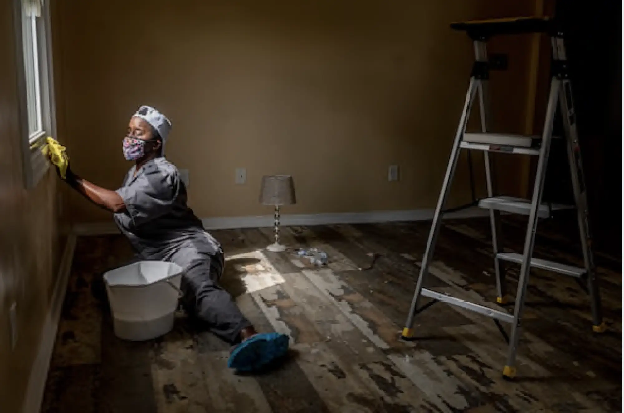 Ally Detrick cleans a client's home for a reduced rate in New Orleans on Saturday, Sept 27, 2020. CREDIT: Photo for The Washington Post by Emily Kask