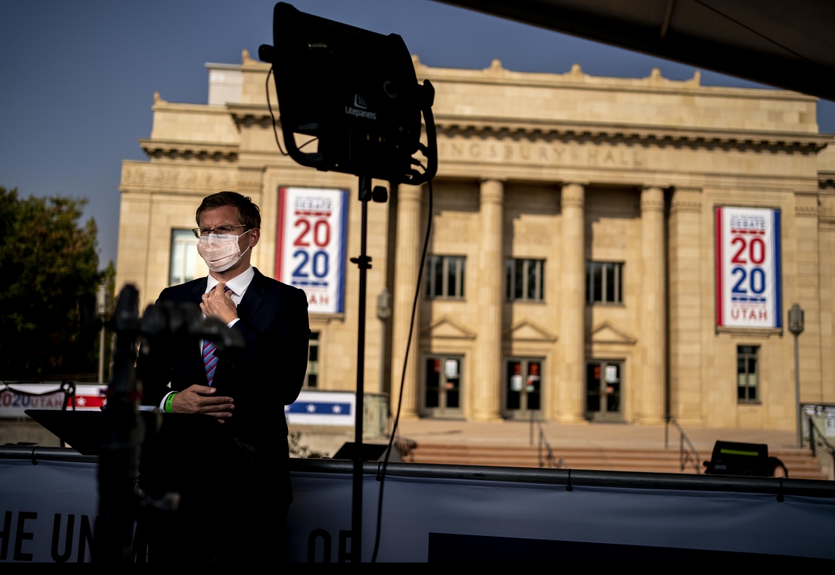 A journalist prepares for a broadcast outside Kingsbury Hall at the University of Utah before Wednesday's debate. Vice President Pence was expected to promote President Trump's record, and Sen. Kamala D. Harris was expected to blame national division on the president. MUST CREDIT: Washington Post photo by Melina Mara