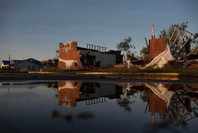 Hurricane Delta overturned vehicles, knocked out power across a broad swath of Louisiana and flooded homes. Some people were only starting to recover from Hurricane Laura, which made landfall in August. MUST CREDIT: Photo by Callaghan O'Hare for The Washington Post