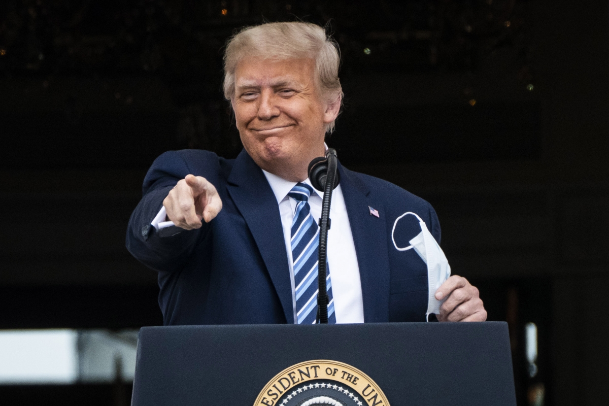 President Trump gestures to supporters as he speaks to them Saturday at the White House. MUST CREDIT: Washington Post photo by Jabin Botsford