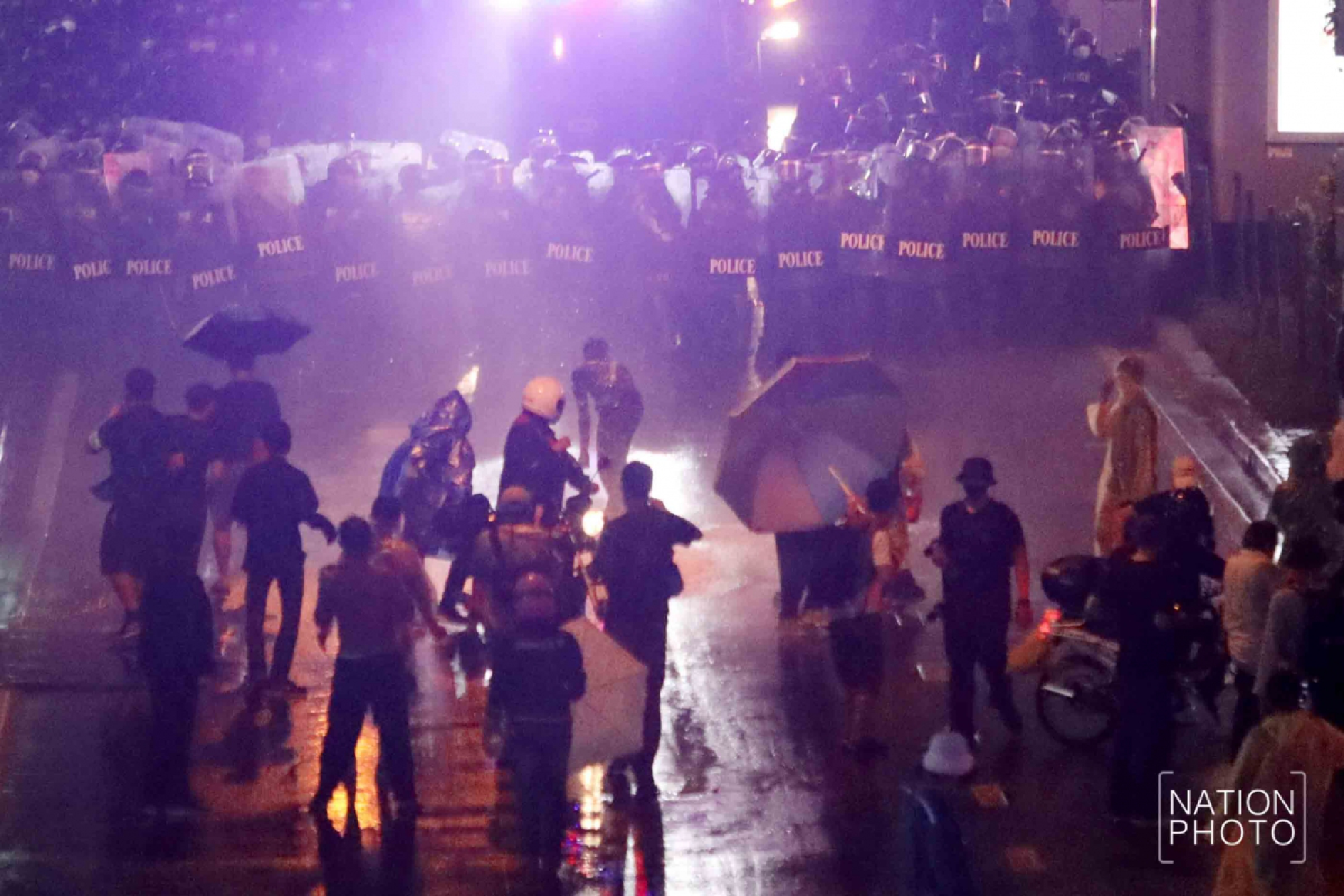 Driven away by water cannons, protesters vow to rally again today