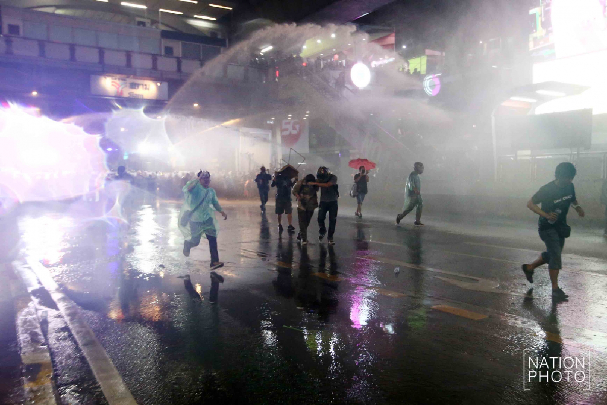 Driven away by water cannons, protesters vow to rally again today