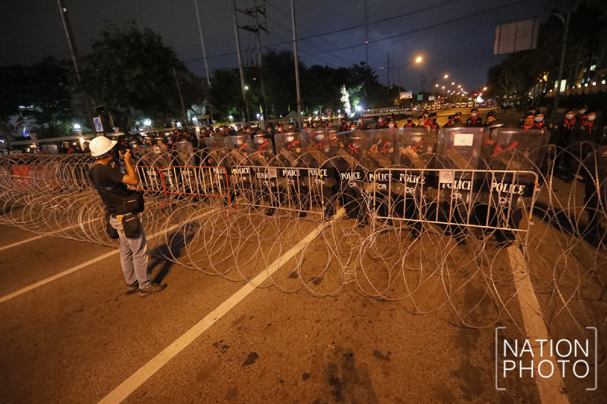 Protesters head to Government House after gathering at Victory Monument