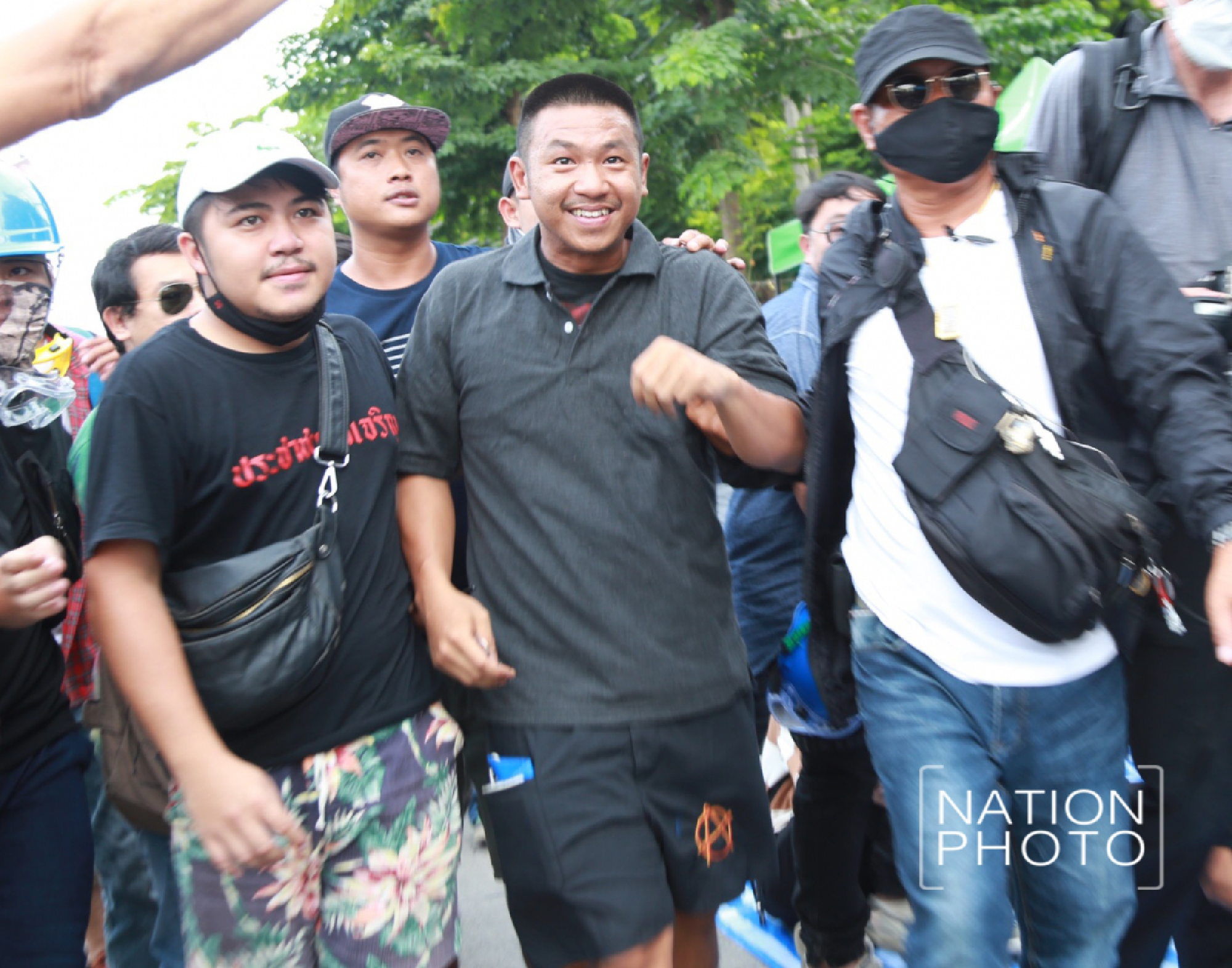 Pro-democracy activist Jatupat “Pai Dao Din” Boonpatararaksa walks out of the Bangkok Remand Prison after the Appeal Court grants him bail on Friday.
