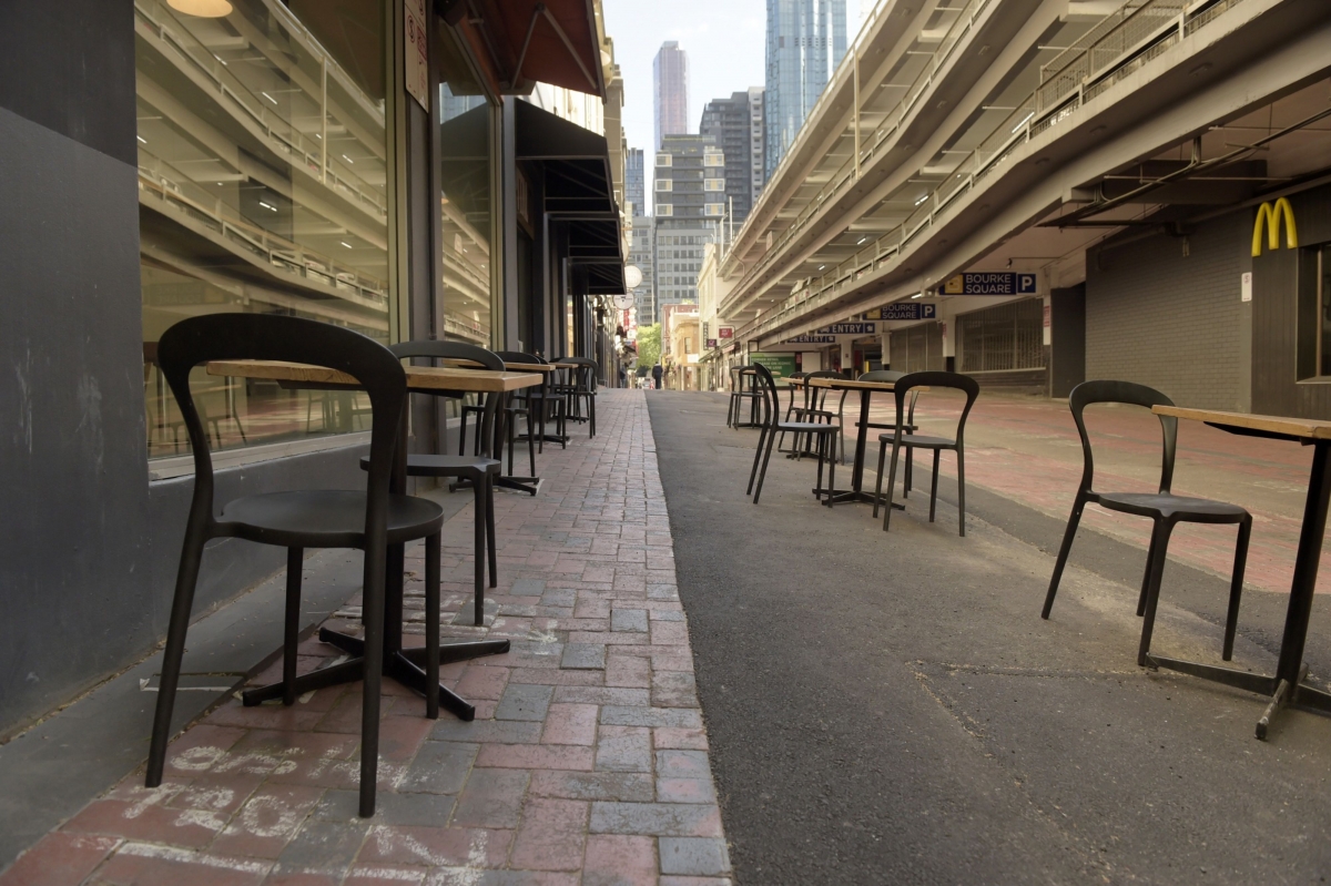 Cafe chairs and tables are set out on a lane in Melbourne, Australia, on Oct 28, 2020. MUST CREDIT: Bloomberg photo by Carla Gottgens.