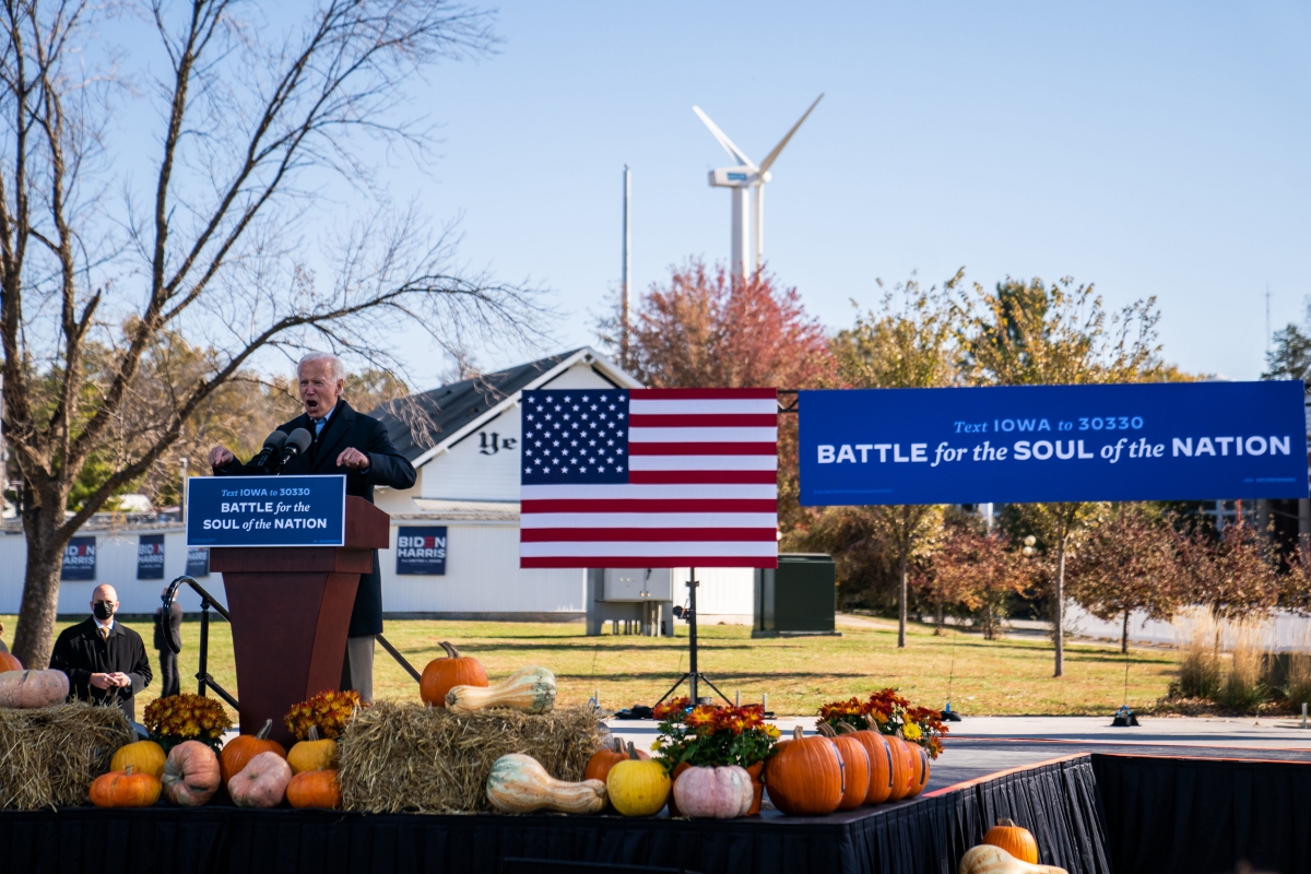 Former vice president and presidential nominee Joe Biden delivers remarks during a drive-in event at the Iowa State Fairgrounds in Des Moines on Friday. MUST CREDIT: Washington Post photo by Demetrius Freeman