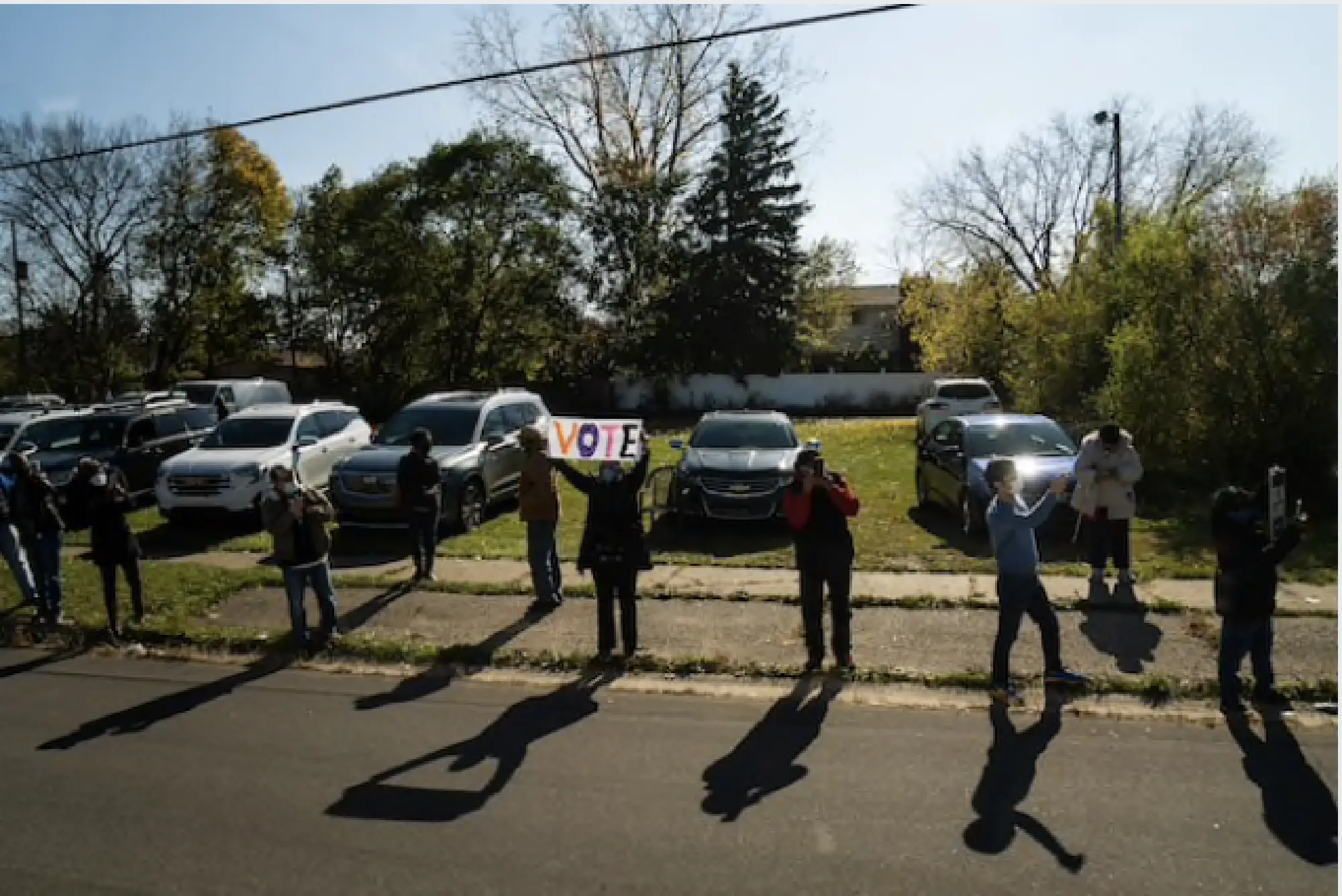 Supporters line the route of Joe Biden's motorcade through Flint, Mich., on Saturday. MUST CREDIT: Washington Post photo by Demetrius Freeman Photo by: Demetrius Freeman — The Washington Post Location: Washington United States