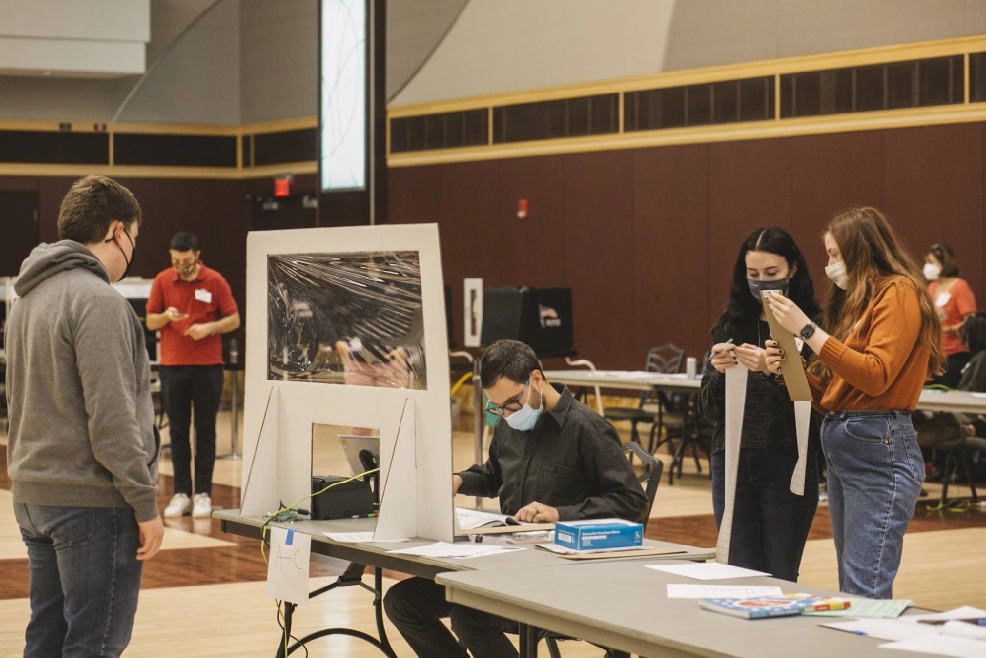 Voters check-in on the campus of Ohio State University in Columbus, Ohio, on Tuesday. MUST CREDIT: Photo for The Washington Post by Andrew Spear /Photo by: Andrew Spear — for The Washington Post
