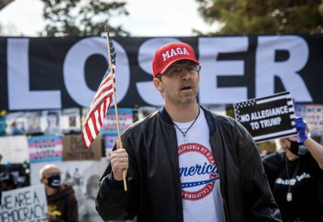 A supporter of President Trump near the White House on Friday. MUST CREDIT: Washington Post photo by Bill O'Leary.