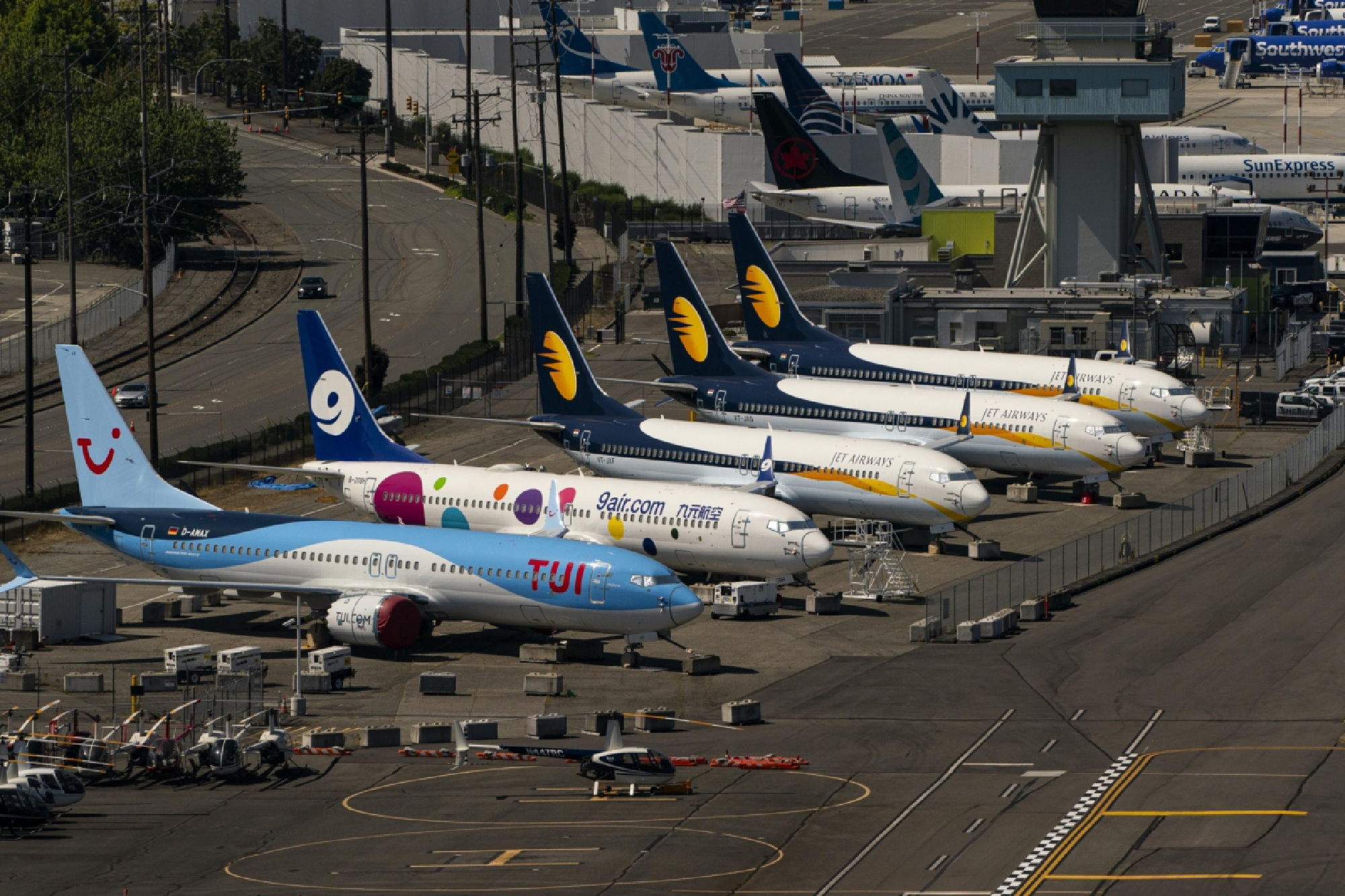Boeing 737 Max airplanes are parked at Boeing Field in Seattle on July 27, 2020. MUST CREDIT: Bloomberg photo by David Ryder