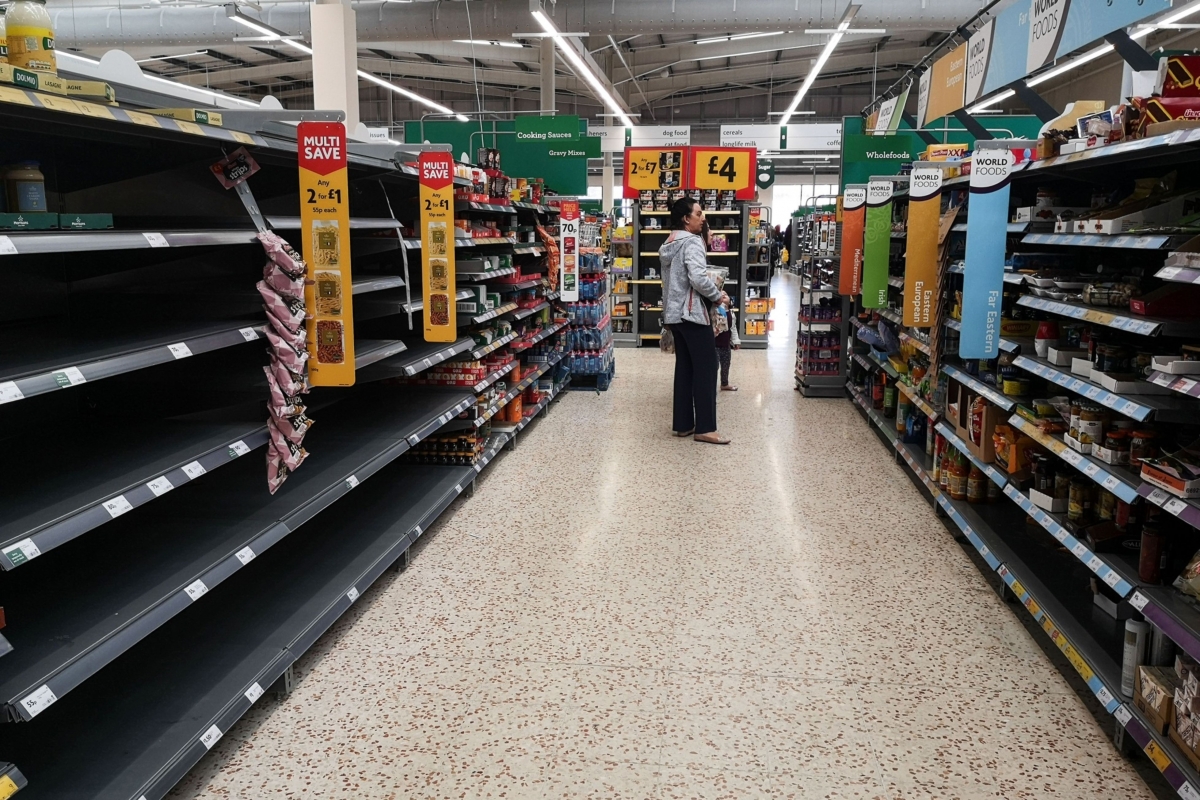 Shelves stand almost empty in the pasta and sauces section of a Morrisons supermarket in on March 18, 2020.MUST CREDIT: Bloomberg photo by Simon Dawson