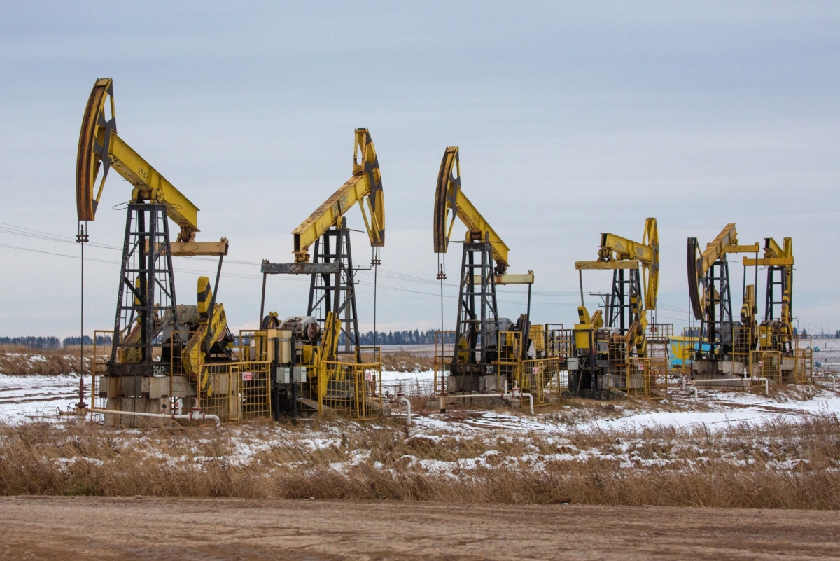 Oil pumping jacks in a Rosneft Oil Co. oil field near Sokolovka village in the Udmurt Republic, Russia, on Nov. 20, 2020. The flaring coronavirus outbreak will be a key issue for OPEC+ when it meets at the end of the month to decide on whether to delay a planned easing of cuts early next year. MUST CREDIT: Bloomberg photo by Andrey Rudakov
