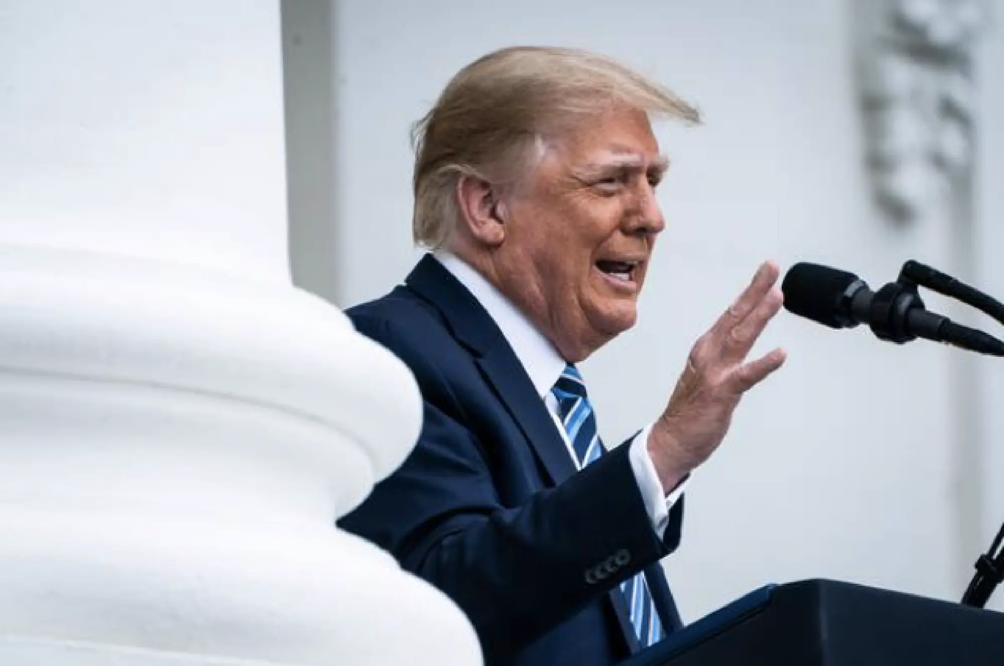 President Trump speaks to supporters from the Blue Room balcony in October. MUST CREDIT: Washington Post photo by Jabin Botsford.