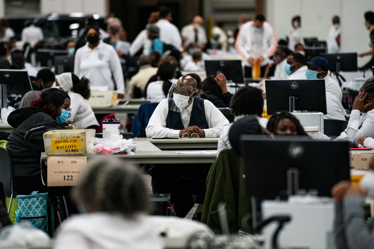 A poll worker prepares to start counting ballots during the 2020 general election at the TFC Center in Detroit, Michigan on Nov. 3. MUST CREDIT: Washington Post photo by Salwan Georges
