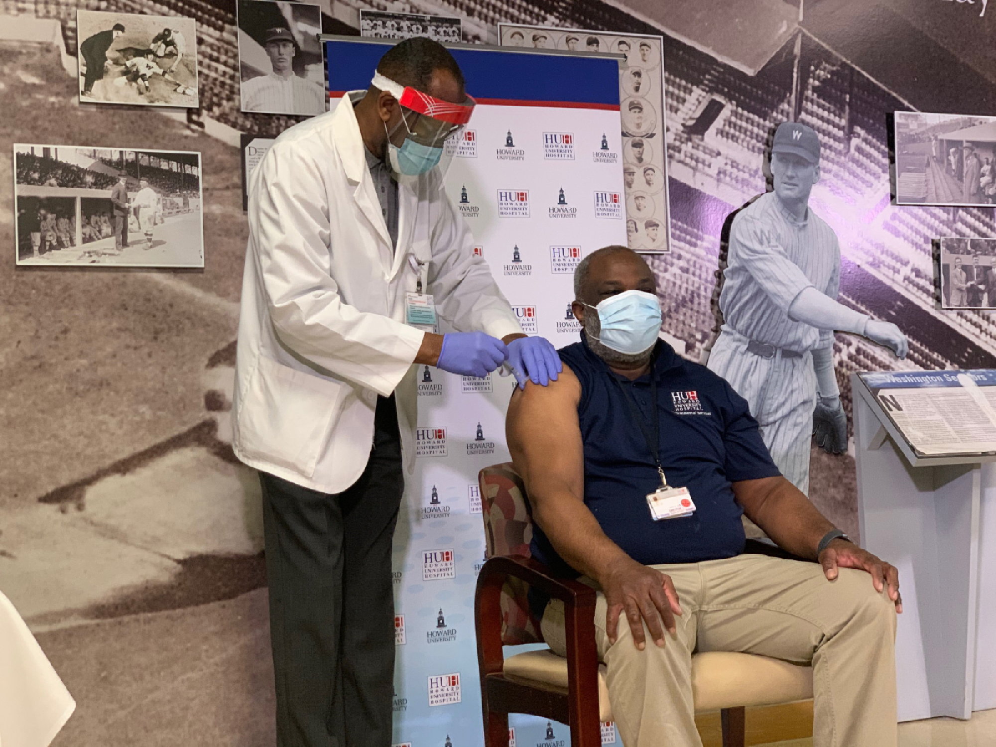 Roy Dunlap receives the coronavirus vaccine at Howard University Hospital in Washington on Tuesday, Dec. 15, 2020. MUST CREDIT: Washington Post photo by Lola Fadulu