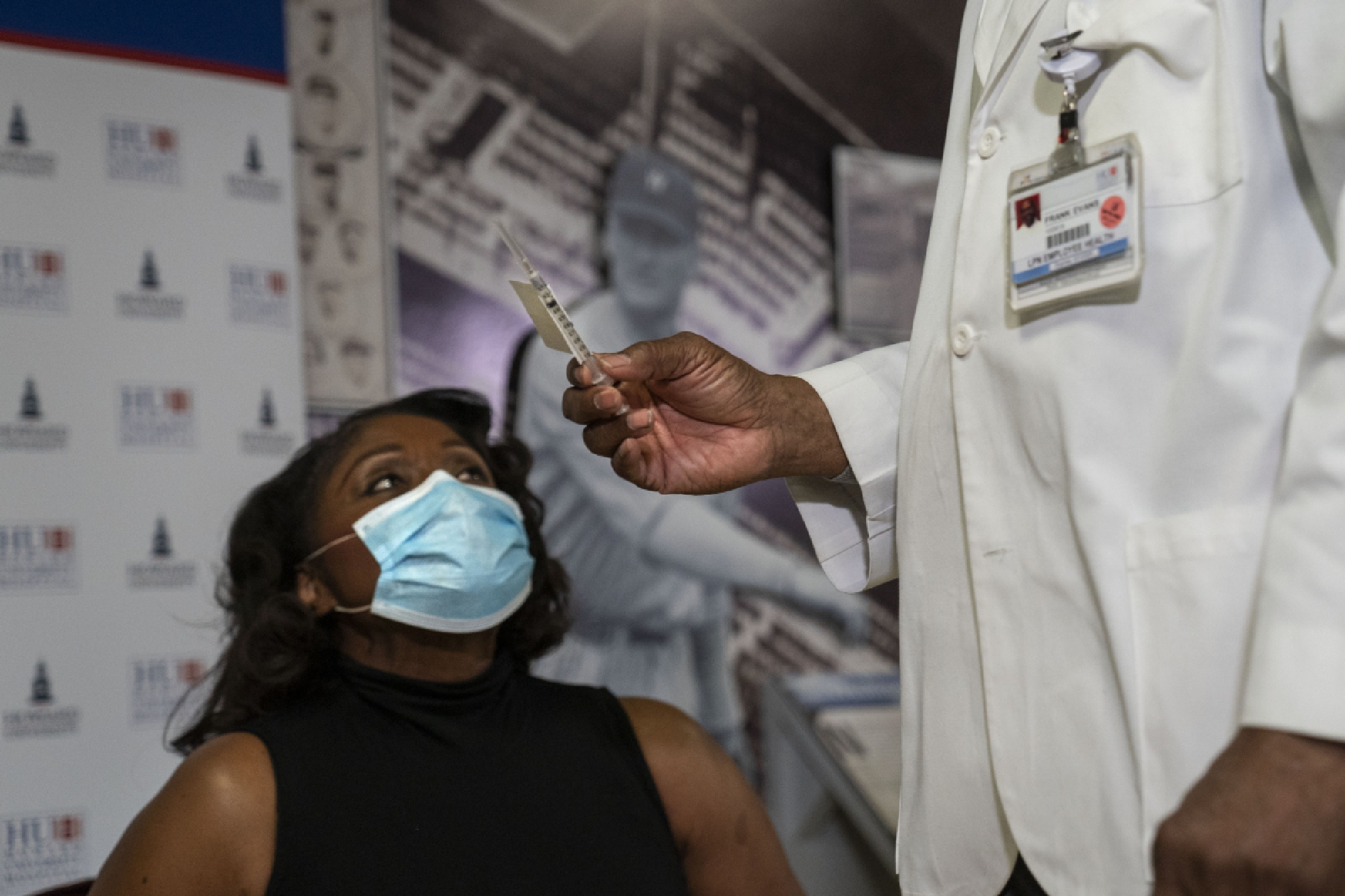 Anita Jenkins, CEO of Howard University Hospital, prepares to receive the coronavirus vaccine on Tuesday, Dec. 15, 2020. MUST CREDIT: Washington Post photo by Michael Robinson Chavez