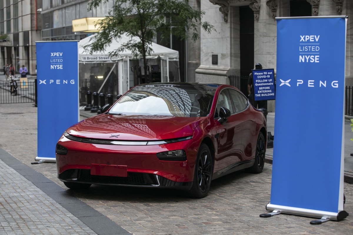 The Xpeng P7 electric vehicle is displayed outside the New York Stock Exchange in New York on Aug. 27, 2020. MUST CREDIT: Bloomberg photo by Jeenah Moon.
