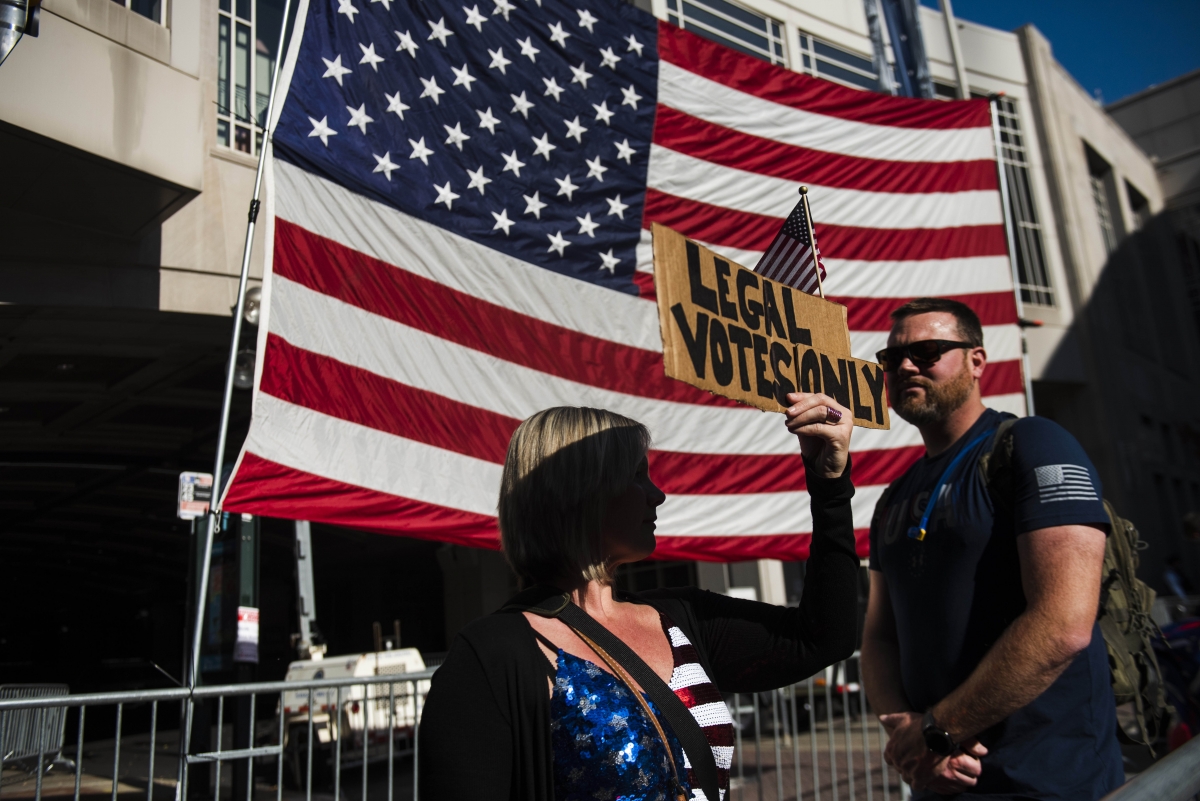 Carri Dusza demonstrates outside the Pennsylvania Convention Center in Philadelphia on Nov. 08, 2020. MUST CREDIT: Photo for The Washington Post by Amanda Voisard