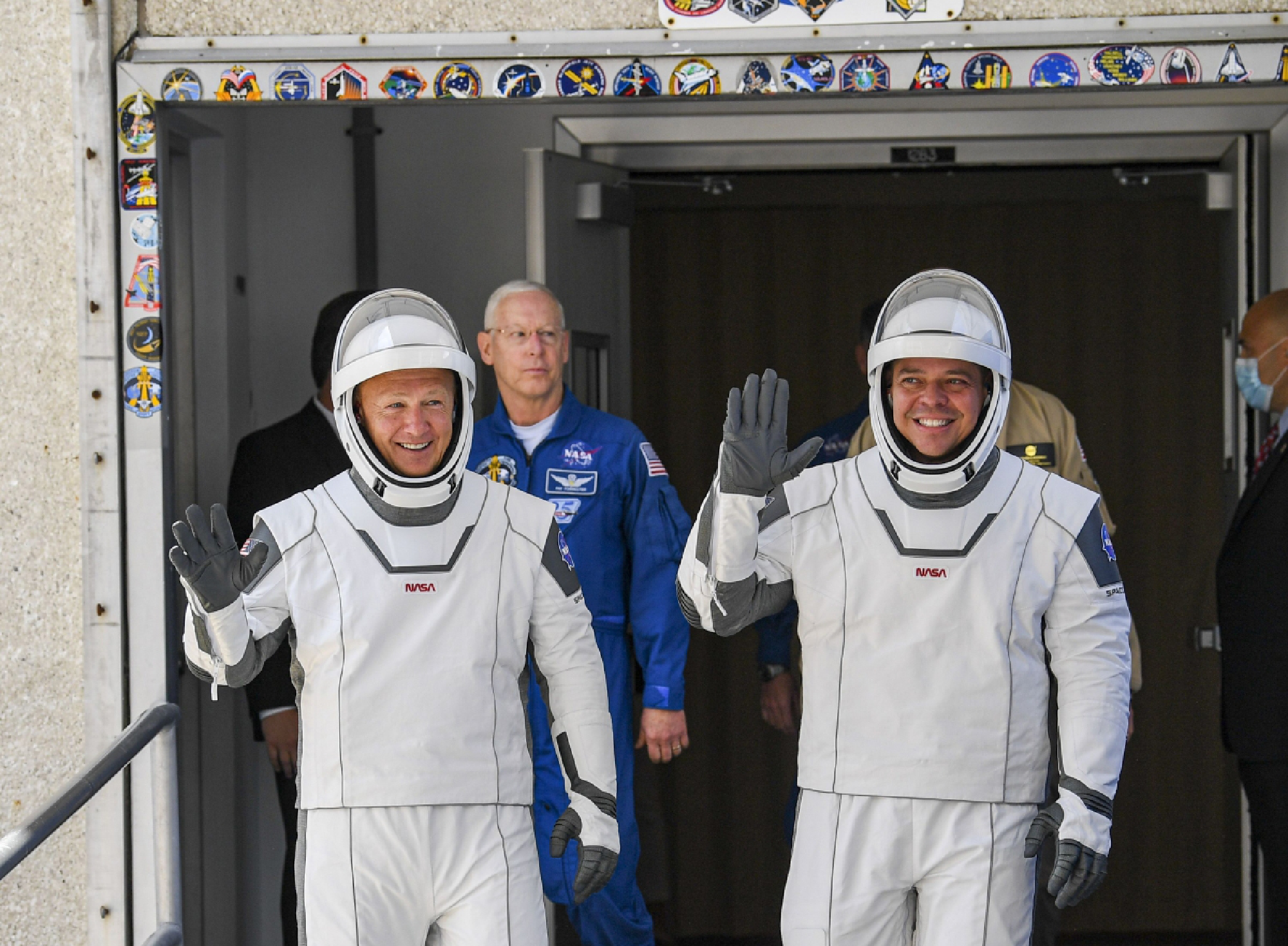 Astronauts Doug Hurley, left, and Bob Behnken on their way to their May flight to the International Space Station. SpaceX is expected to launch NASA astronauts to space twice in 2021. MUST CREDIT: Washington Post photo by Jonathan Newton