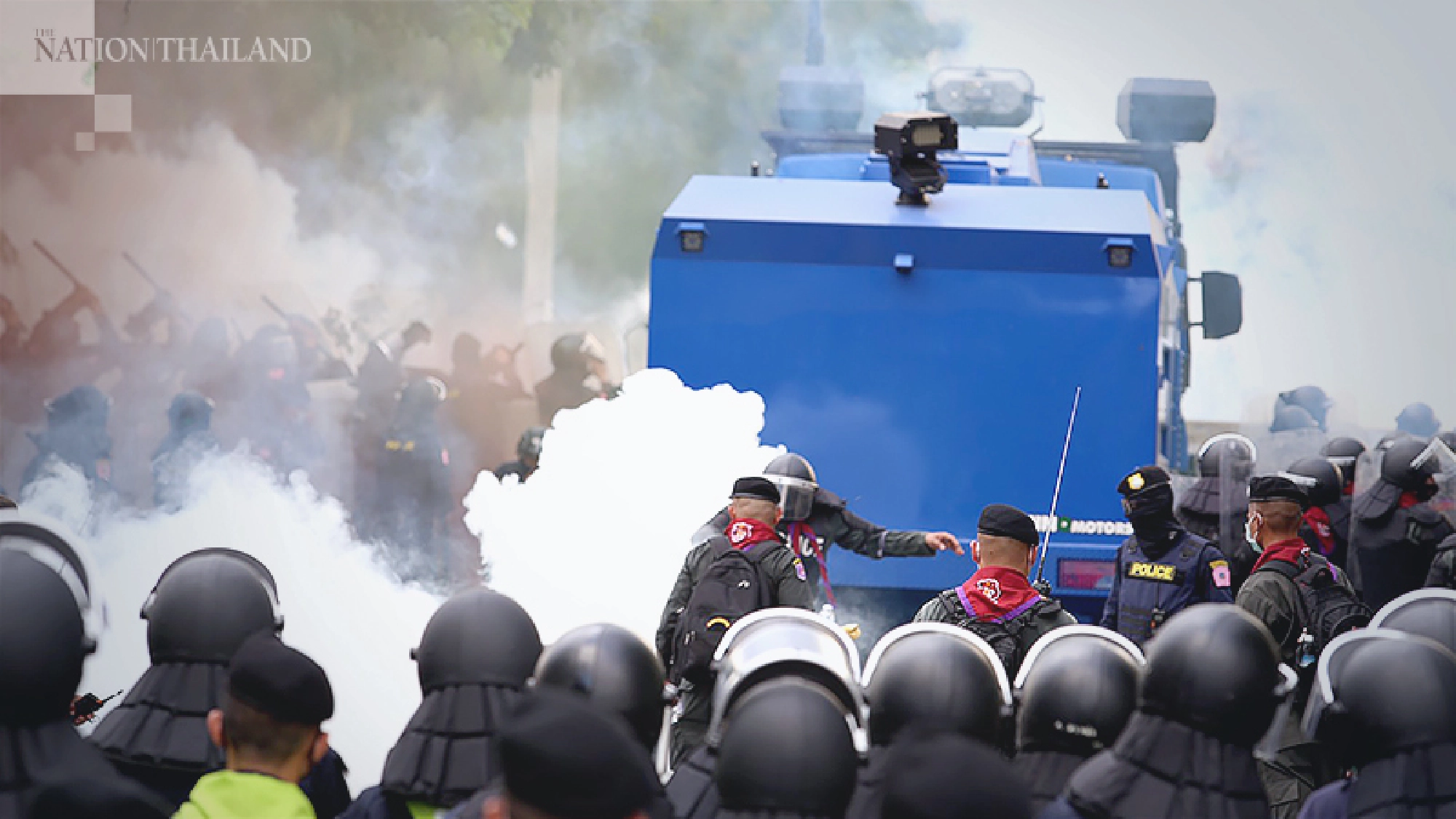 Protesters clash with police who used water cannon and tear gas to disperse them during a rally for charter change outside Parliament on November 17.